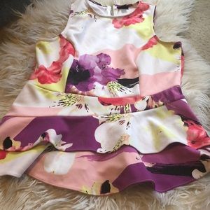 Multi-colored peplum top